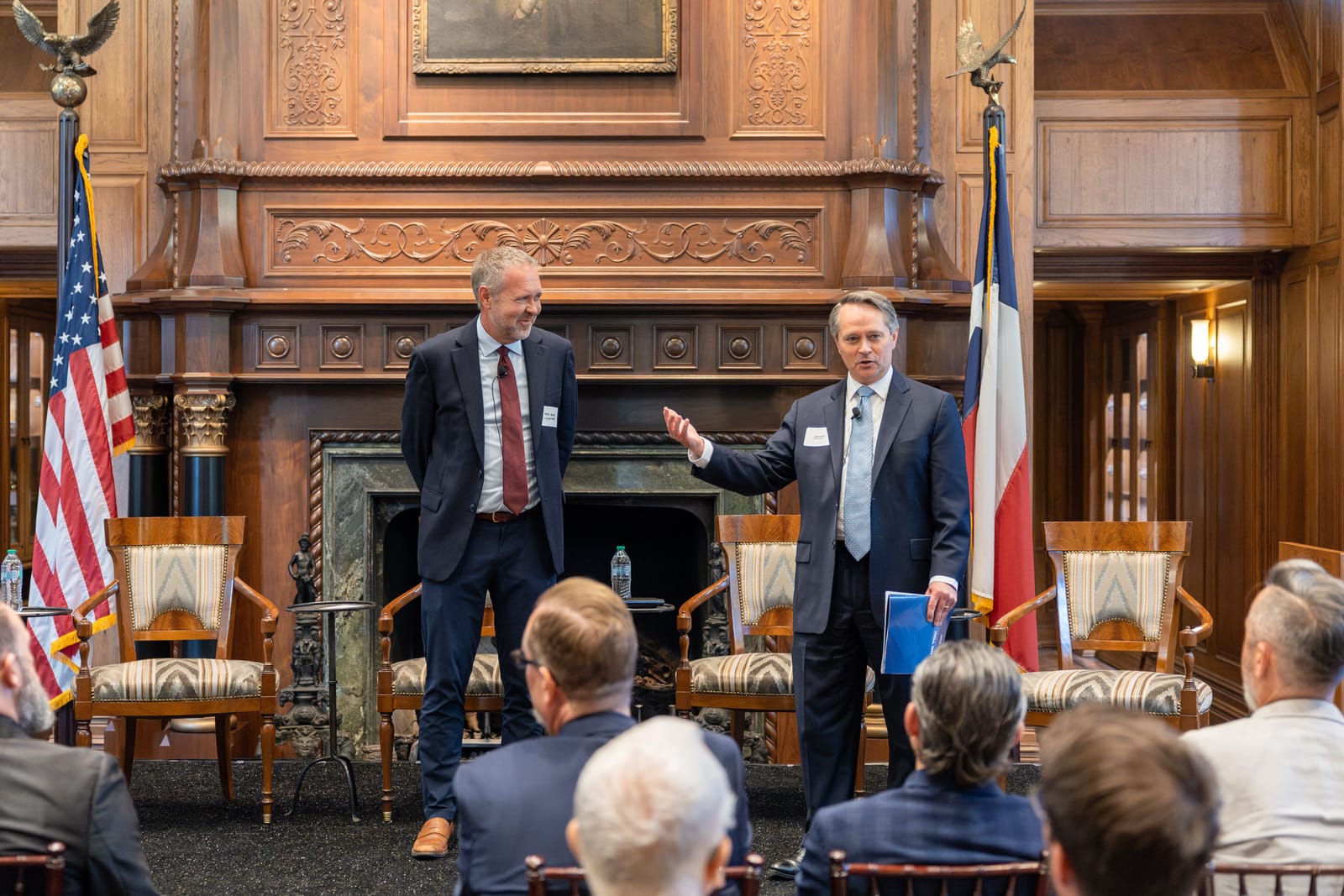 Speakers on stage during the joint Dallas event